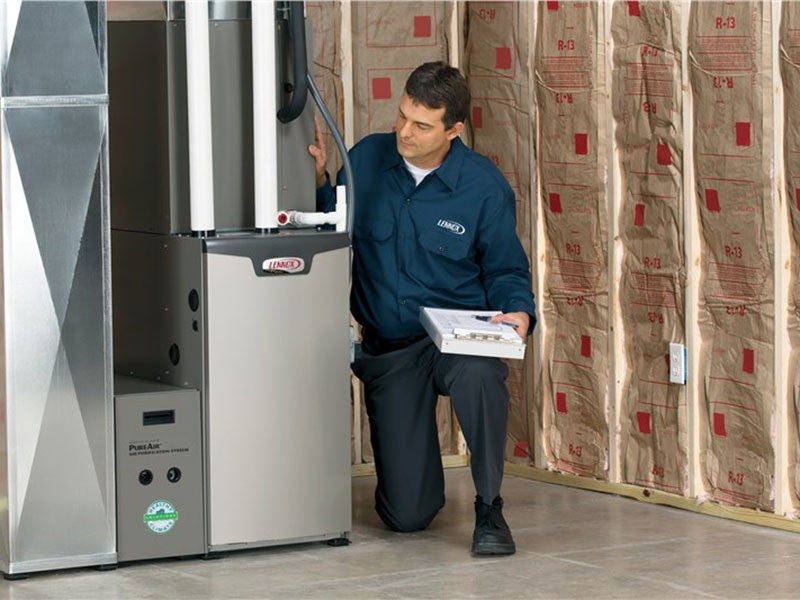 technician working on furnace