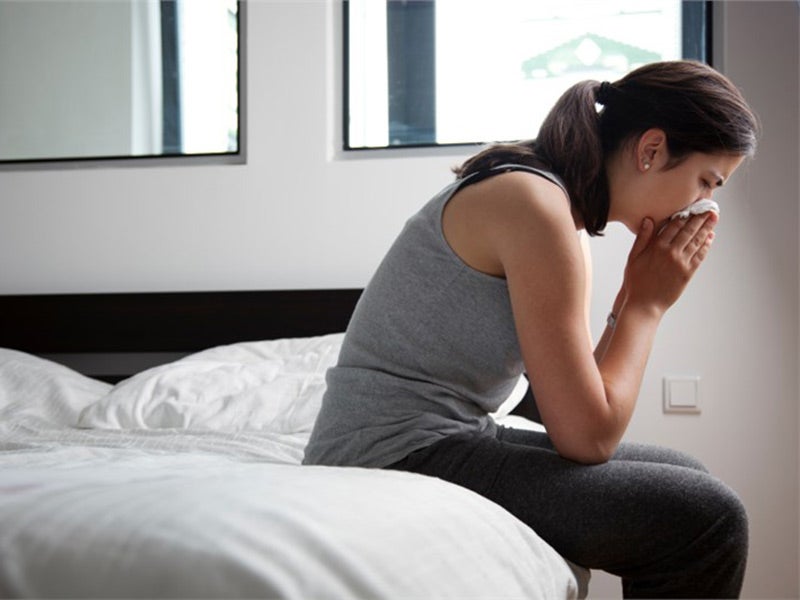 Woman suffering cold