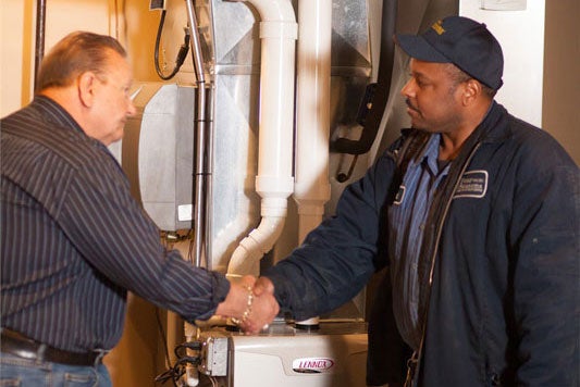 technician and client shaking hands