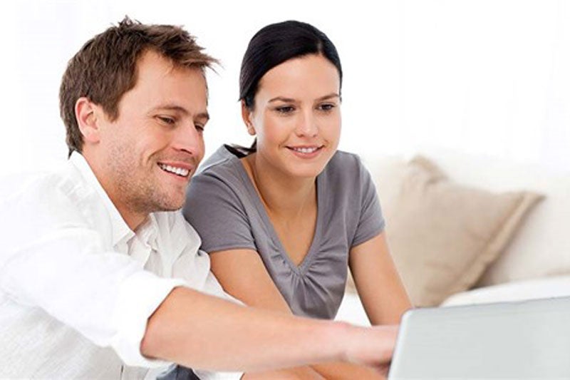 couple looking at laptop