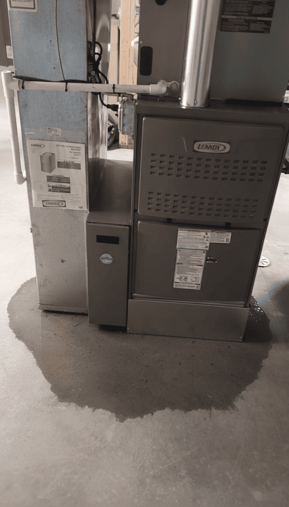 water pooling around base of furnace