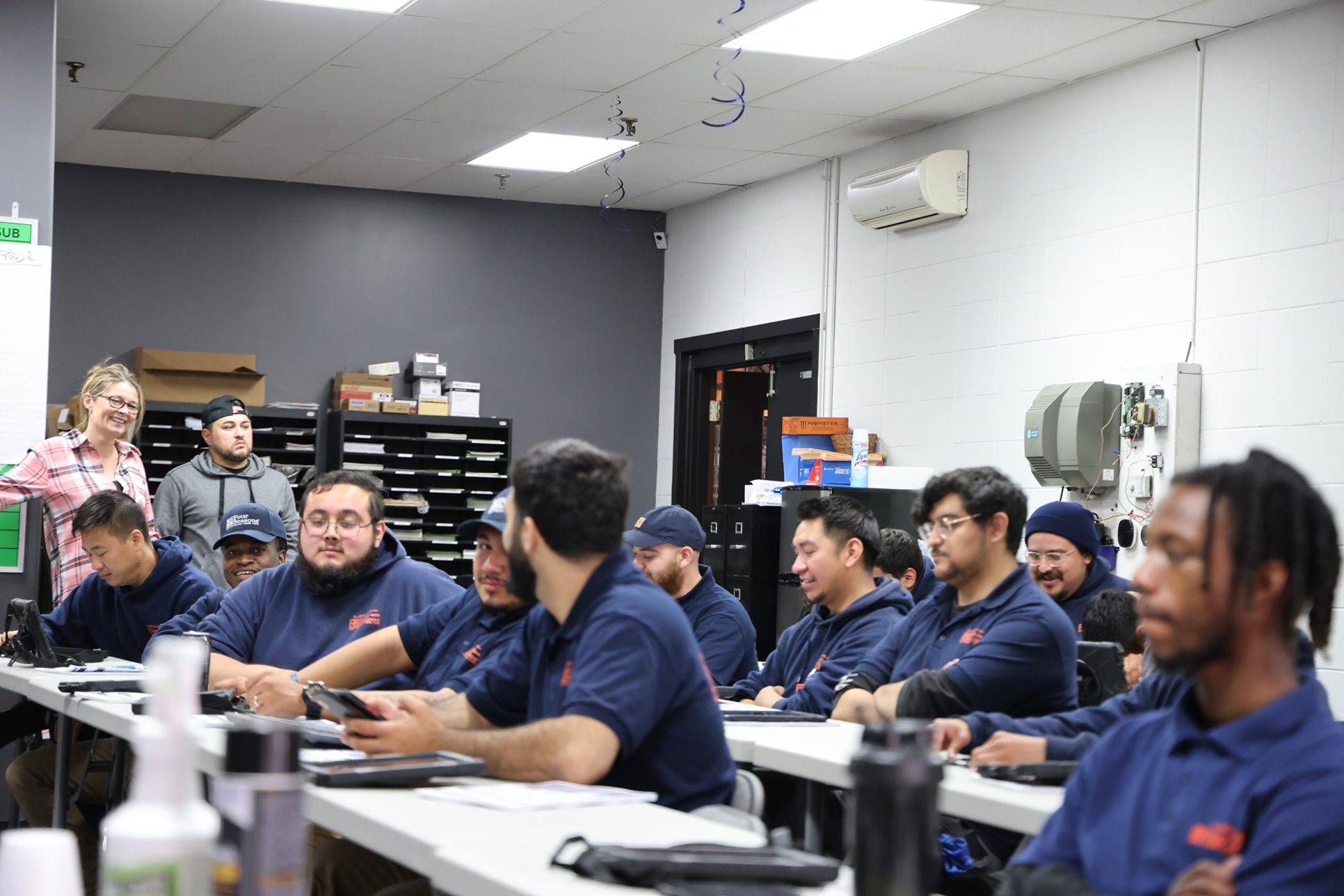 Large training session with HVAC apprentices